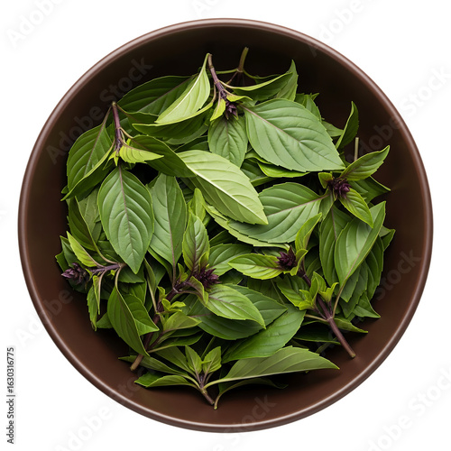 Fresh thai basil leaves in bowl - culinary herb image