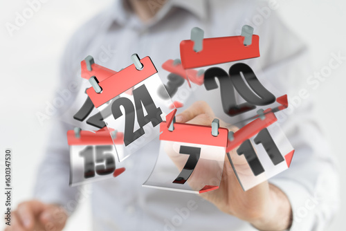 Businessman scheduling appo...