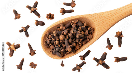 Wallpaper Mural Aromatic cloves scattering falling from wooden spoon on transparent background Torontodigital.ca