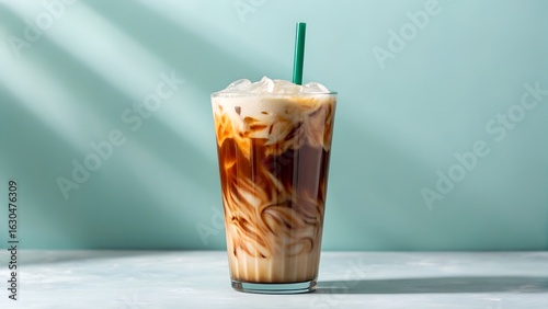 Refreshing iced caramel macchiato drink on a bright sunny day background