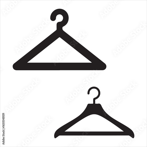 Two black silhouettes of clothing hangers on a white background