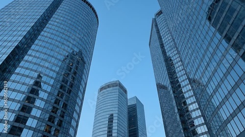 Wallpaper Mural Low-angle shot of modern skyscrapers, clear blue sky. Torontodigital.ca