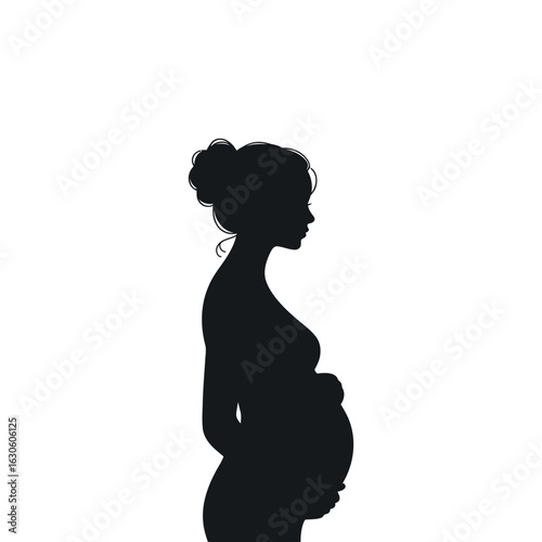 Elegant Silhouette of a Pregnant Woman in Profile Holding Her Belly with a Serene and Peaceful Demeanor