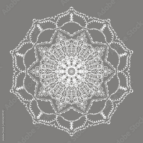 Symmetrical lace pattern on a gray background. For printing and textiles.
