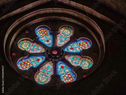 Naklejka Stained glass rose window in Santo Domingo Church, Soria, Spain