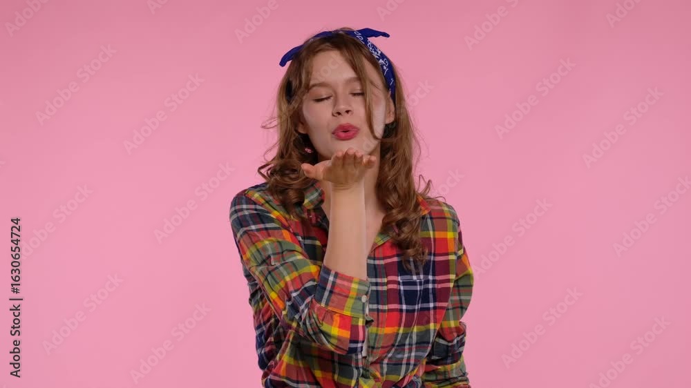 Young Woman in Plaid Shirt and Blue Bandana Smiling Young Woman in Plaid Shirt and Blue Bandana Smiling