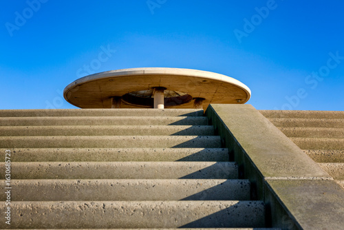 Foto A modern circular shelter rises above concrete steps on Cleveleys seafront, featured as Niamos in Andor, Episode 7,bathed in crisp November light and cinematic history