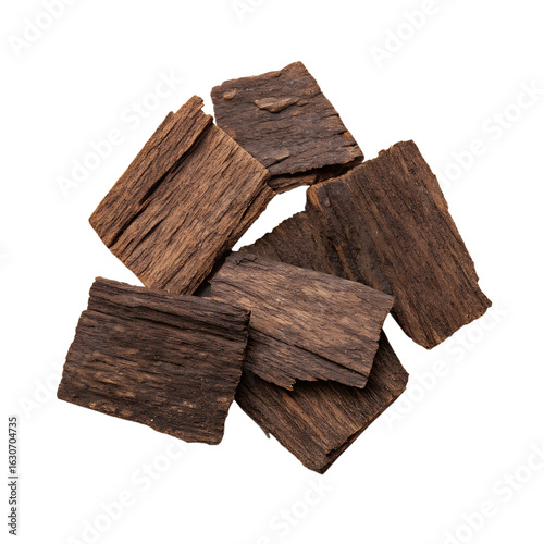 Dark oud wood chips isolated on transparent background