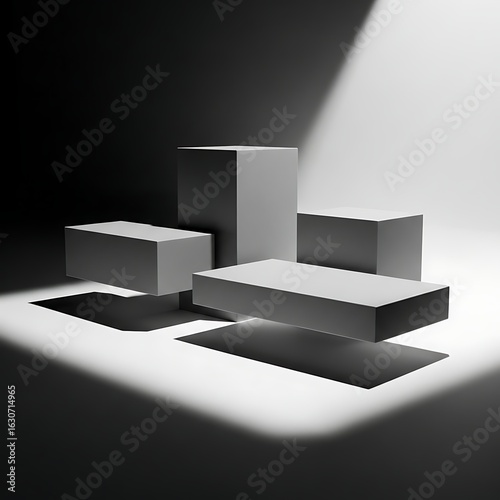 Geometric abstract composition featuring stacked rectangular blocks illuminated by a dramatic spotlight creating strong shadows and highlights in a studio setting