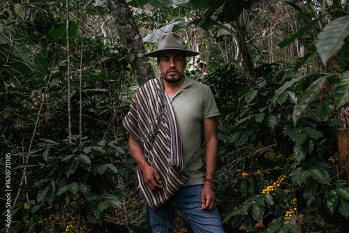 Male farmer harvesting on his coffee plantation