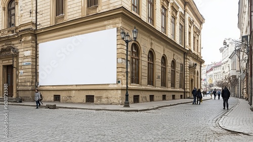 Fototapeta Naklejka Na Ścianę i Meble -  ultra-realistic European old town street scene, historic beige stone building with arched windows and a large blank white rectangular billboard on the wall facing the street corner