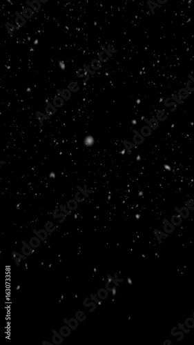 Seamless Vertical Snowfall Loop On Black Background For Winter Projects