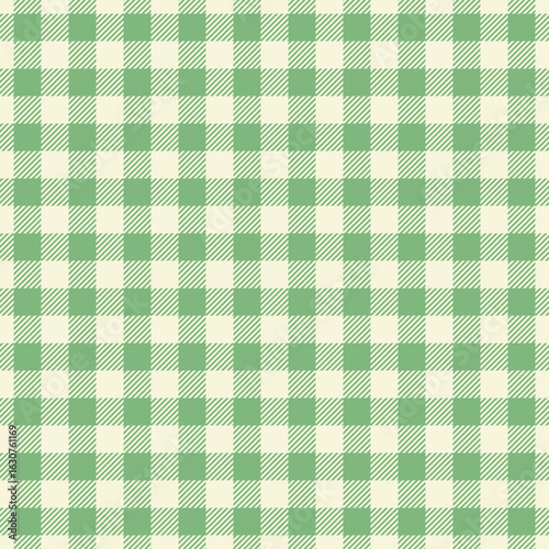 Classic green and cream gingham check pattern. Perfect for backgrounds, textiles, or packaging design.  Evokes feelings of nostalgia, home, and rustic charm.