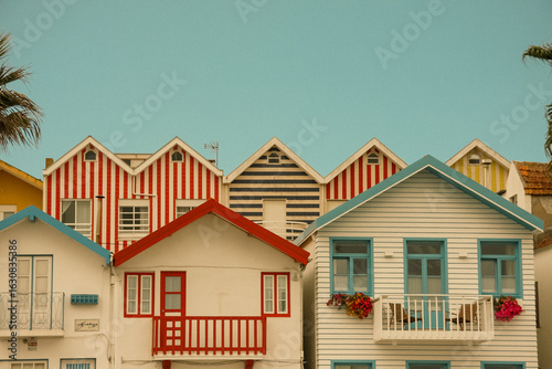Colorful striped fisherman houses in Costa Nova, Aveiro, Portugal.
