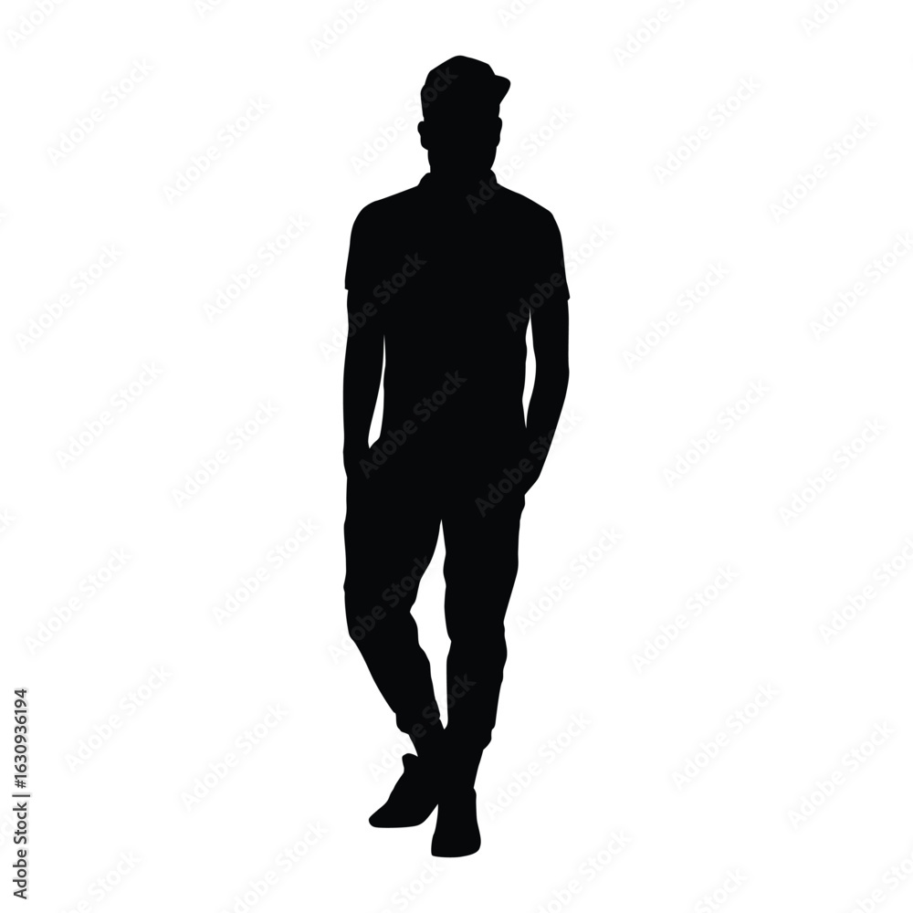 Fototapeta premium The silhouette of a man wearing a hat standing casually