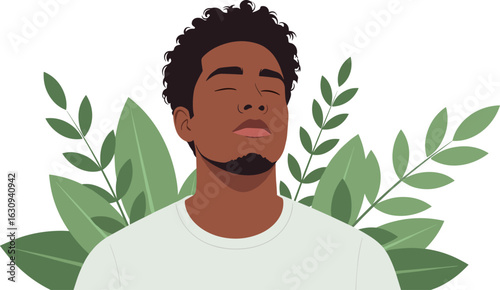 African American man relaxing with closed eyes and green leaves