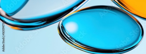 Abstract Composition Of Multiple Circular Shapes In Turquoise And Yellow Colors On A Light Blue Background