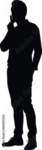 Silhouette of a Man Gesturing with Finger on Lips for Silence
