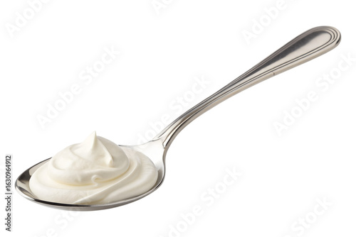 Creamy yogurt on a spoon isolated on transparent background