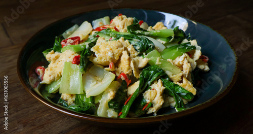 Konstfotografi Stir-fried bok choy or pak choy with scrambled eggs, showcasing vibrant green and golden colors
