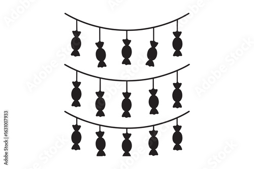 Black candy ornaments on strings white