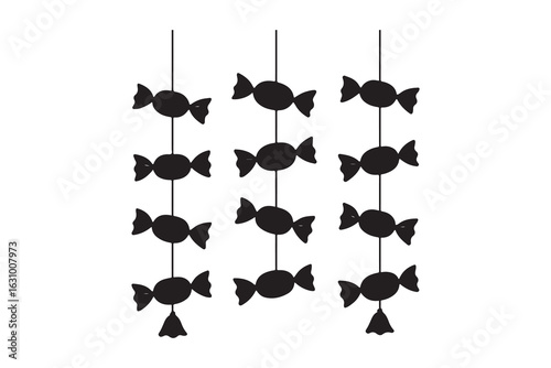 Black candy ornaments on strings white