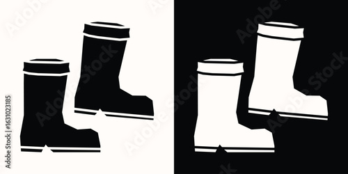 Black and White Filled Gardening Boots Icon in a Cutout Style