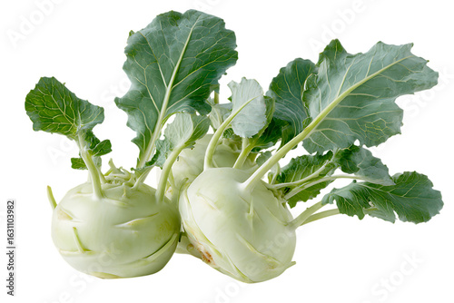 Fresh kohlrabi with leaves on a black background