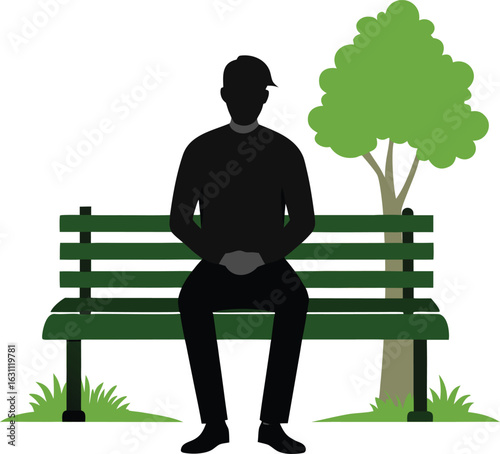 Man, silhouette sitting alone on park bench next to green tree