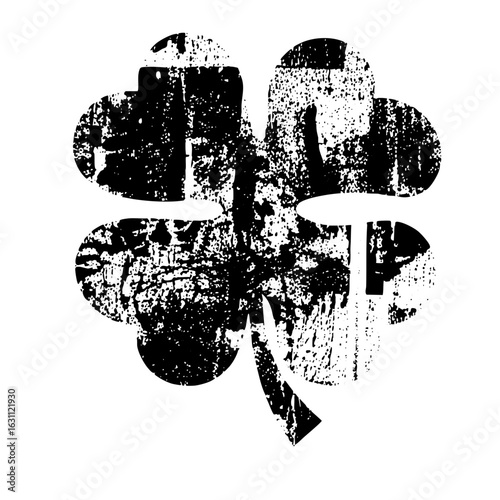Vector Distressed four-leaf clover with a vintage texture.