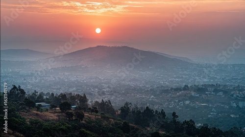 Sunrise over Addis Ababa, Ethiopia: A breathtaking panorama of the city nestled in the mountains at dawn.