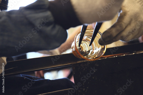 Fotografie process of making of glass cup, close up details