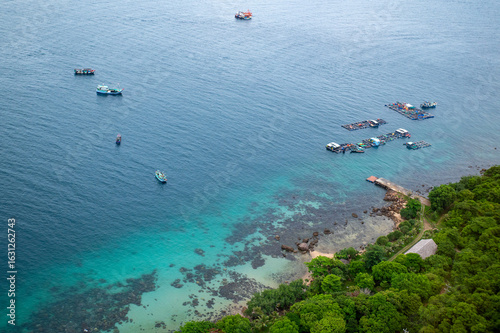 Konstfotografi Aerial view of Phu Quoc's Hon Thom fishing port and coastline, captured from the