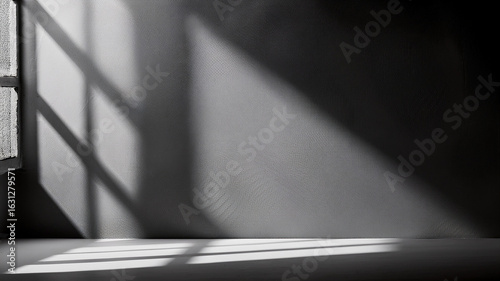 Moody dark surface with natural light shadows from a window. Great for bold, modern layouts.
