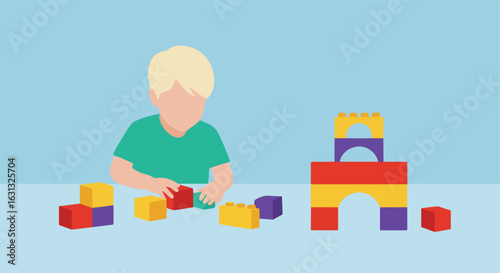 Boy building blocks on floor with a castle in background. Childhood development