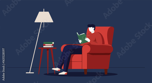 Man reads book in armchair at night. Lamp, stacked books beside. Solitude use
