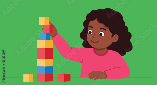 A girl builds a tower with toy blocks on a green background for education