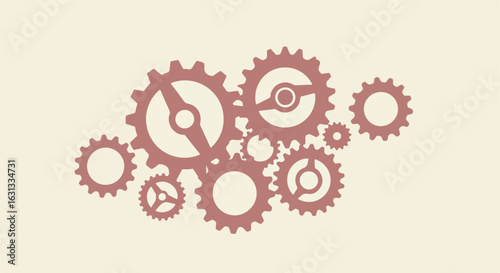 Gears turning in beige background representing mechanism, machinery or processing