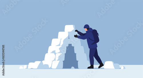Building igloo on flat white ground; winter activity, blue backdrop