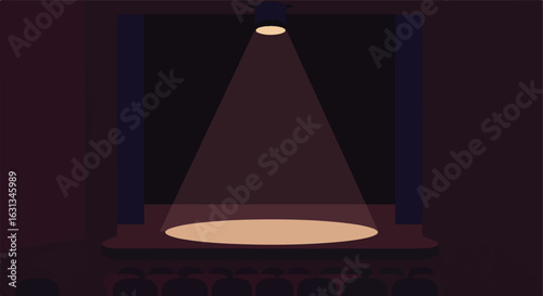 Spotlight beams down on empty stage as audience seats await a show