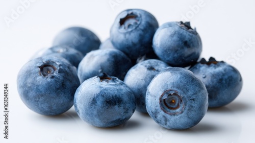 ripe blueberries on a white background