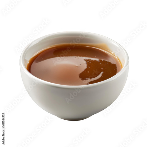 White Ceramic Bowl Filled with Brown Sauce Against Transparent Background