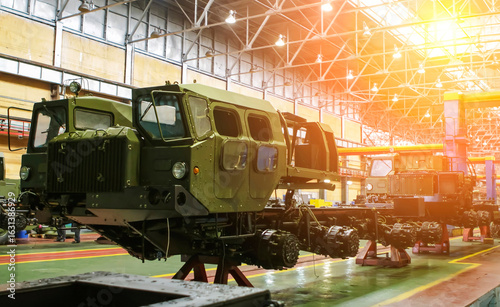 Production line of military equipment at Wheel Tractor Plant in a manufacturing facility during daytime operations