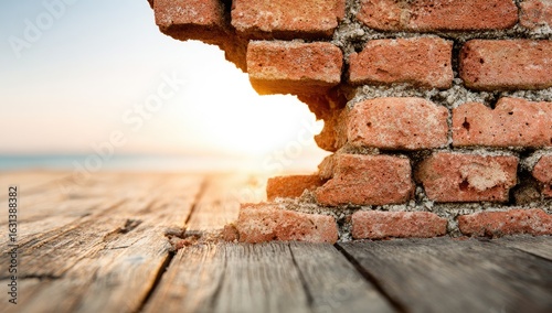 Broken brick wall, sunburst, wooden deck, ocean view