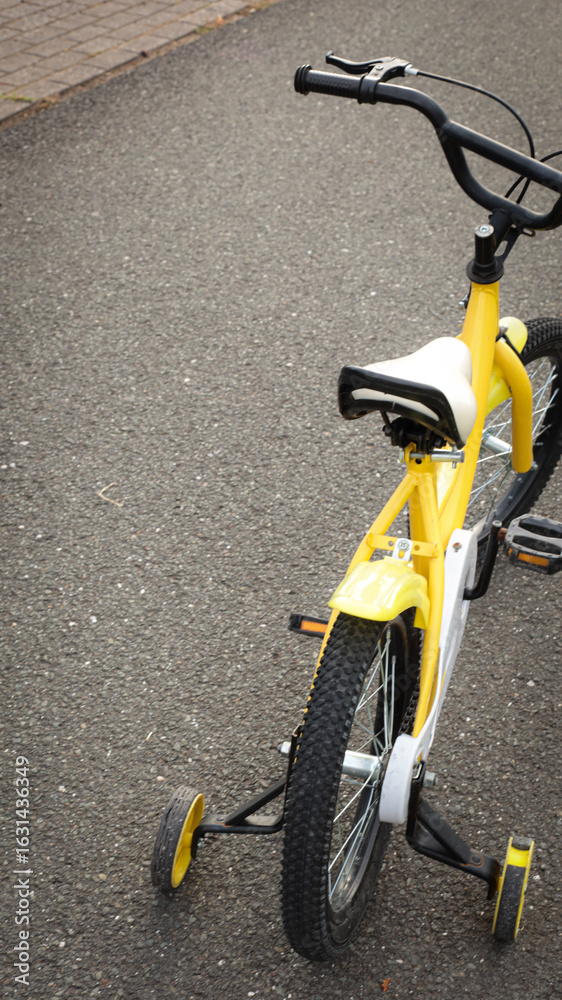 Fototapeta premium Children's bike with training wheels