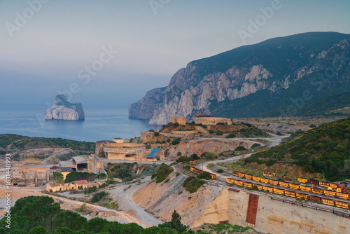 point of interest Masua Sardinia old mining village with iconic Pan di Zucchero rock in the background