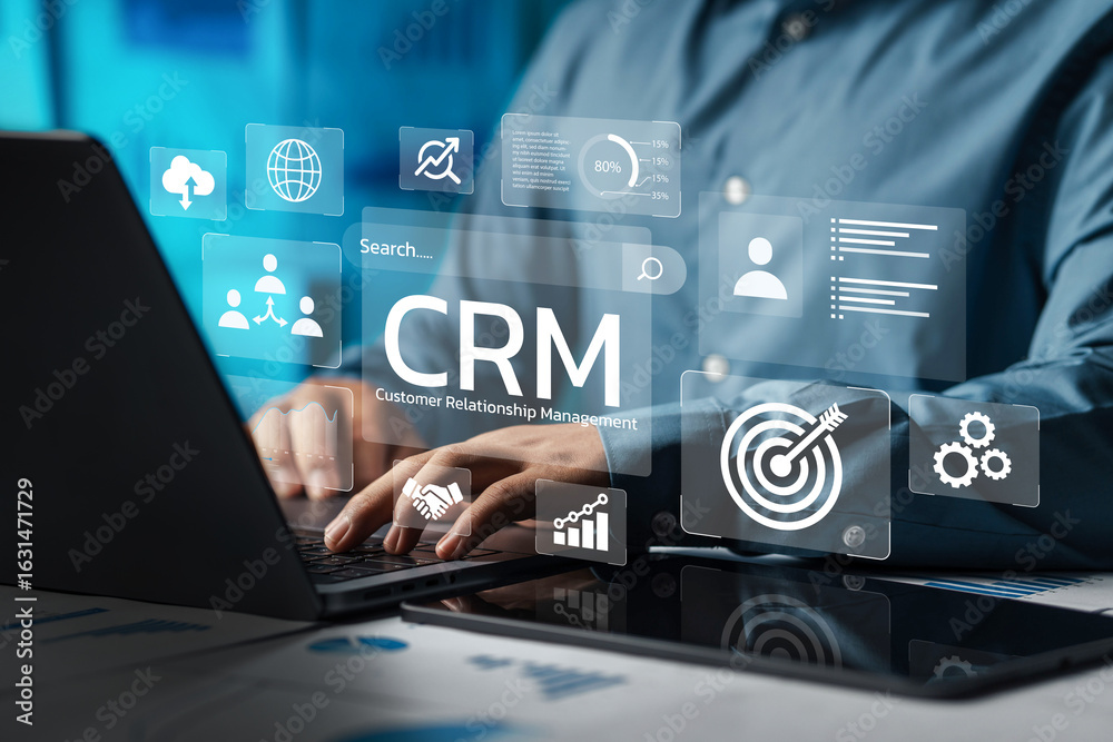 Naklejka premium Businessman using computer and dashboard to analyze CRM data on virtual technology screen with CRM icon, customer relationship management concept for connecting business technology database.