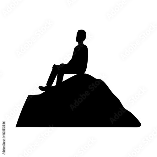 Man sitting on a rock silhouette