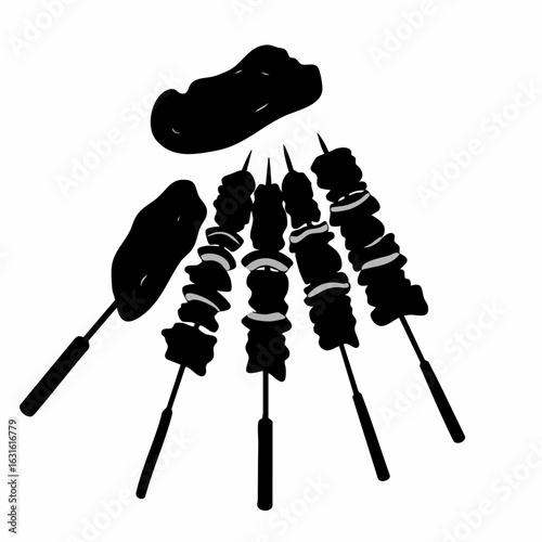 Black and white skewers with meat and onion are ideal for simple illustrations. These skewers, also called brochettes, are suitable for recipes.