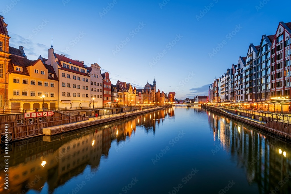 Obraz premium Gdansk with beautiful old town over Motlawa river